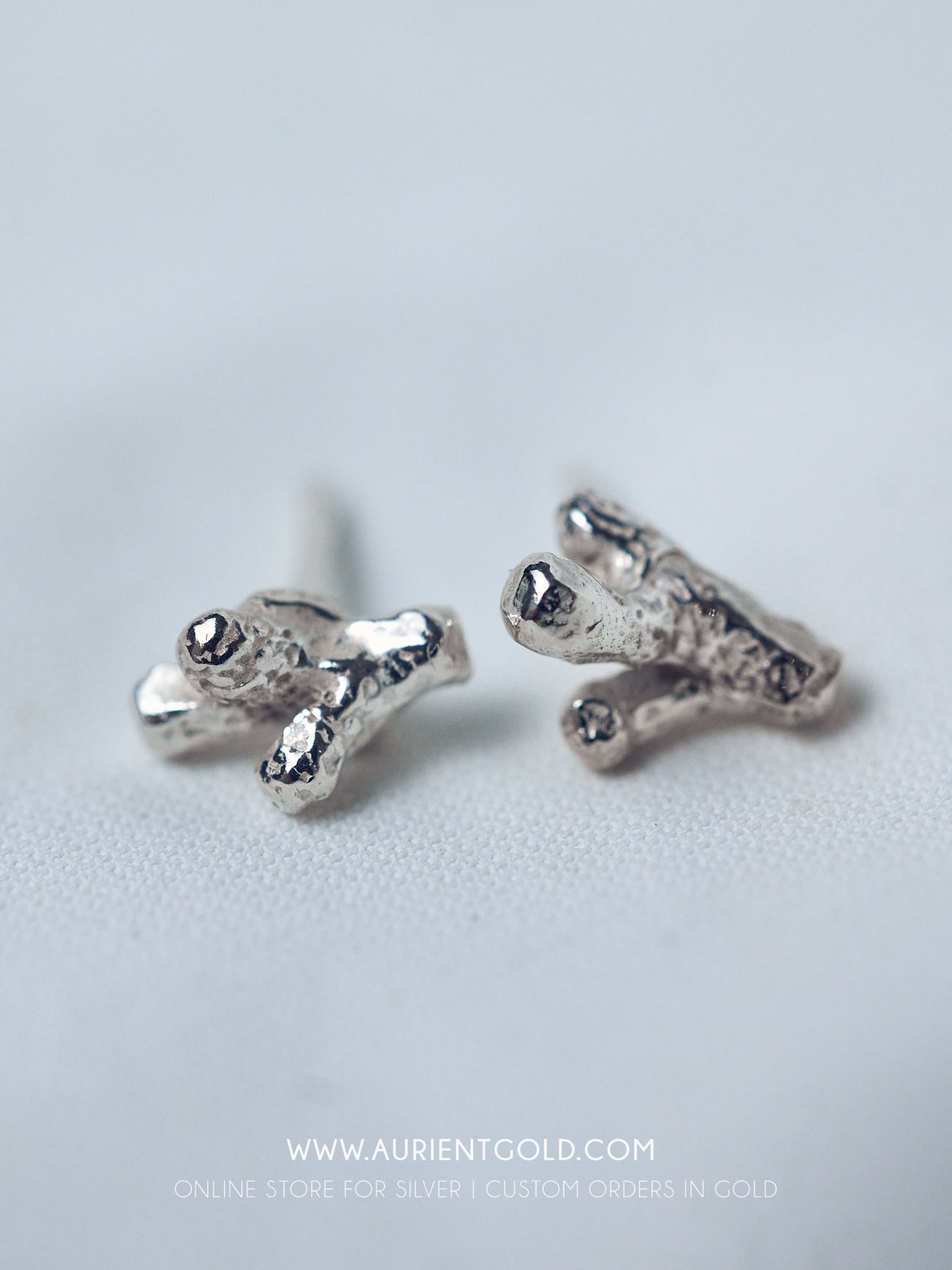 Mini coral stud earrings in sterling silver