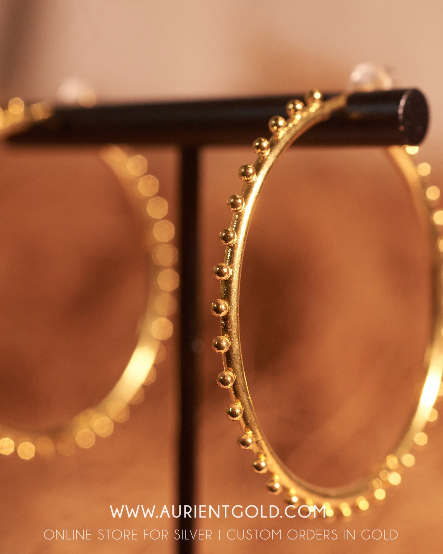 Large gold plated sterling silver hoop earrings