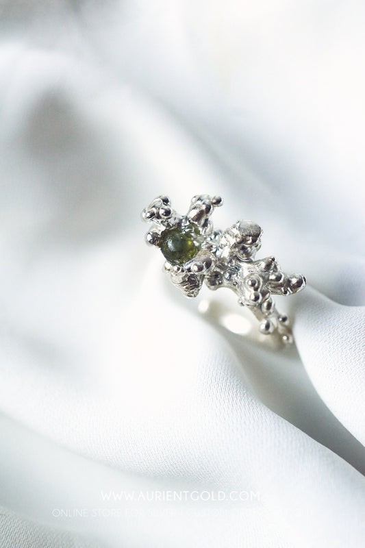 Coral sterling silver ring with green Sappire